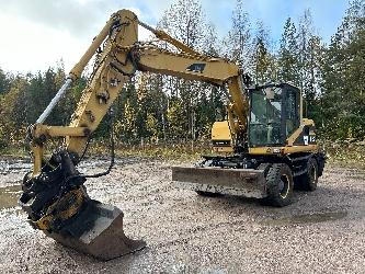 CAT M312