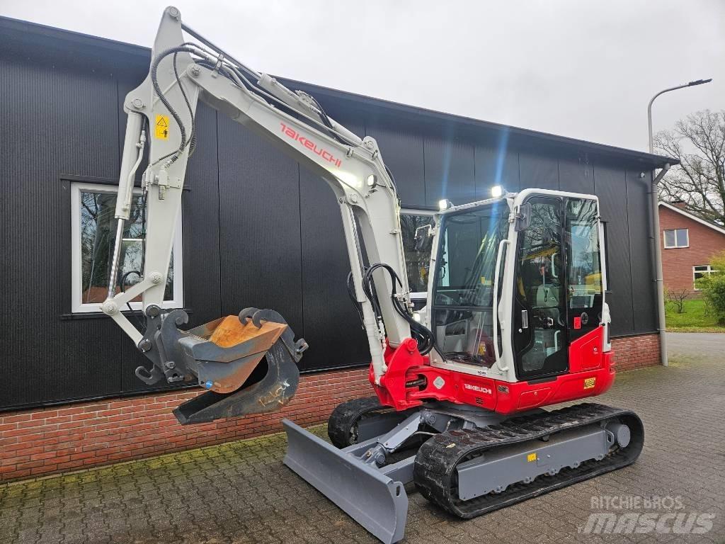 Takeuchi TB250-2 Bagri za prekladanje primarnih/sekundarnih surovin