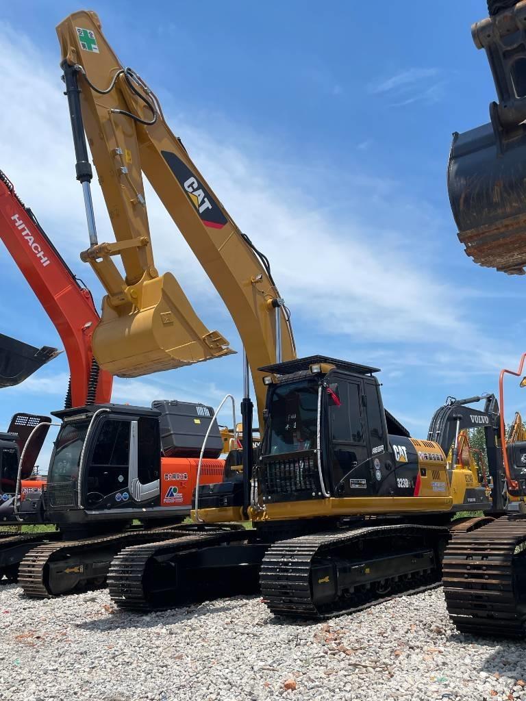 CAT 323 Bagri goseničarji