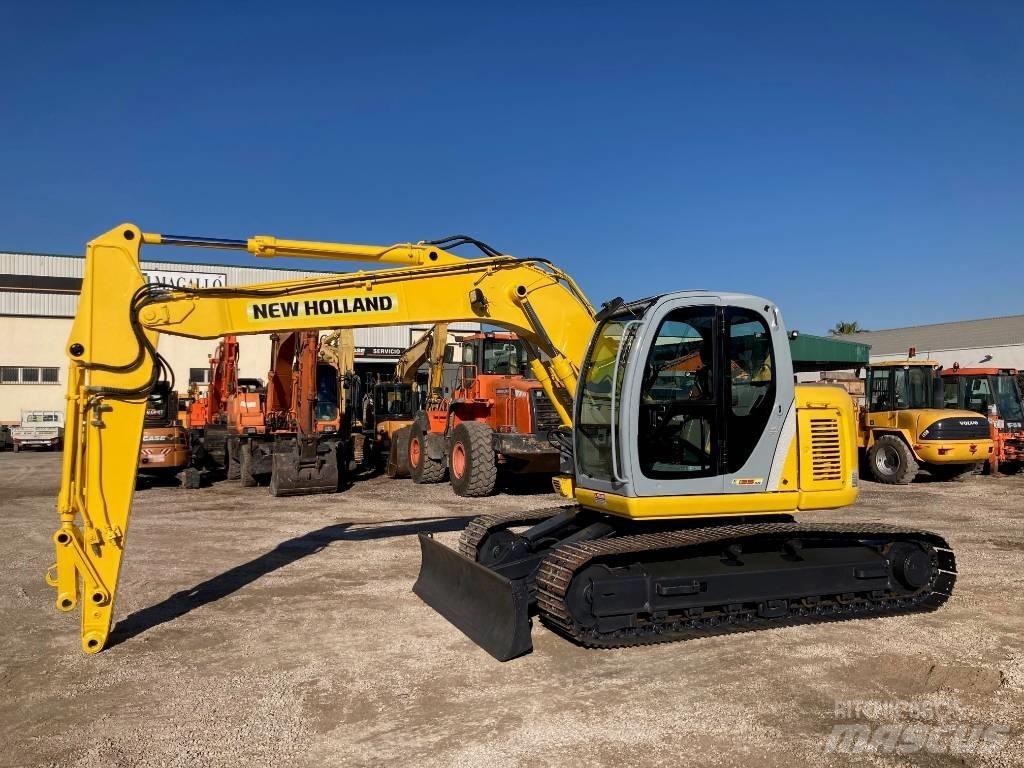 New Holland E 135 SR Midi bagri 7t – 12t