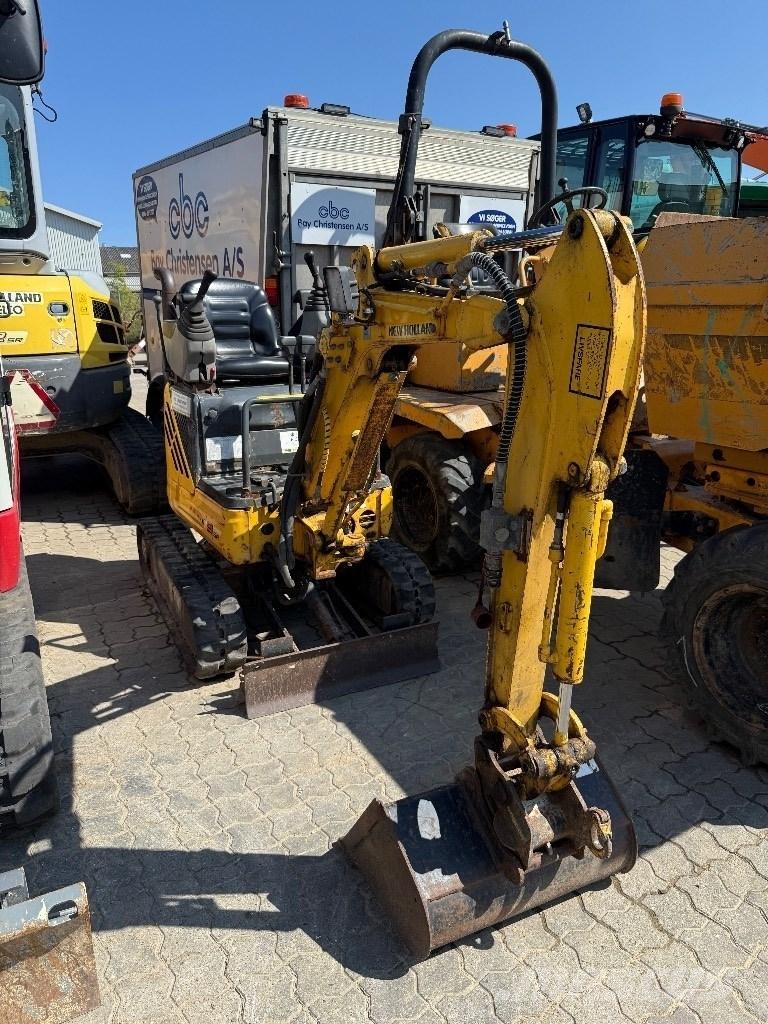 New Holland E 9 SR Mini bagri <7t