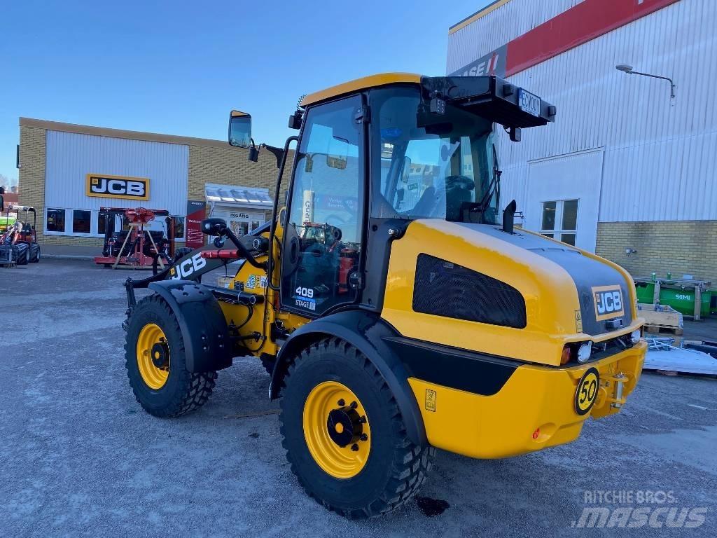 JCB 409 Kolesni nakladalci