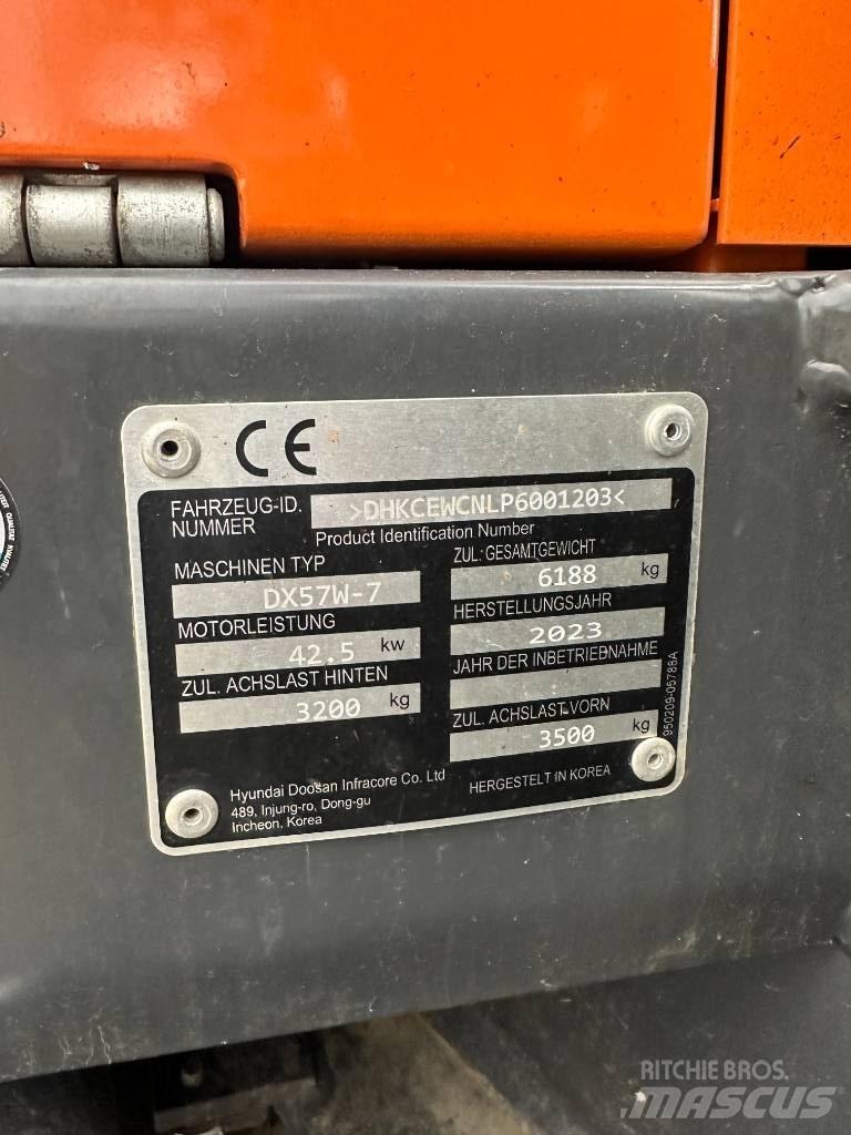 Develon DX 57 W-7 Bagri na kolesih