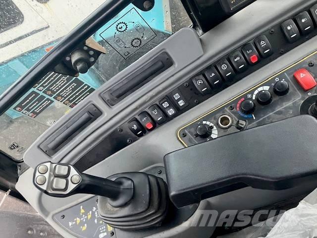 JCB 409 Kolesni nakladalci