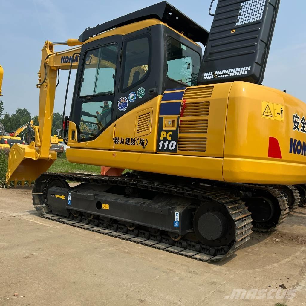 Komatsu 110 Bagri goseničarji