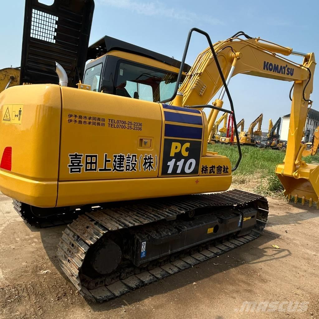 Komatsu 110 Bagri goseničarji