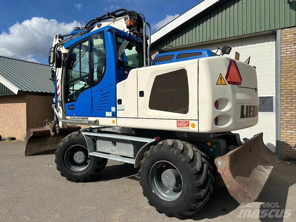 Liebherr A914 Bagri na kolesih