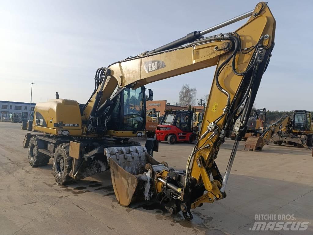 CAT M 313 D Bagri na kolesih