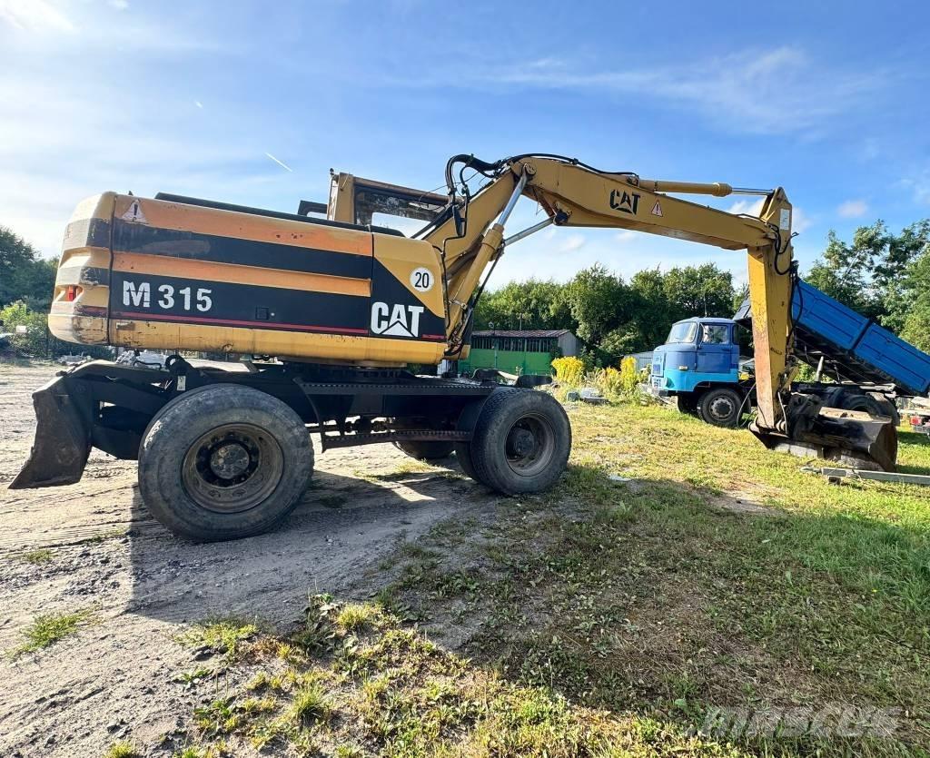 CAT M 315 Bagri na kolesih