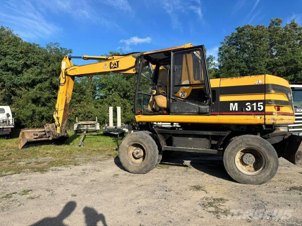 CAT M 315 Bagri na kolesih