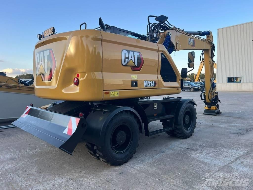 CAT M314 Bagri na kolesih