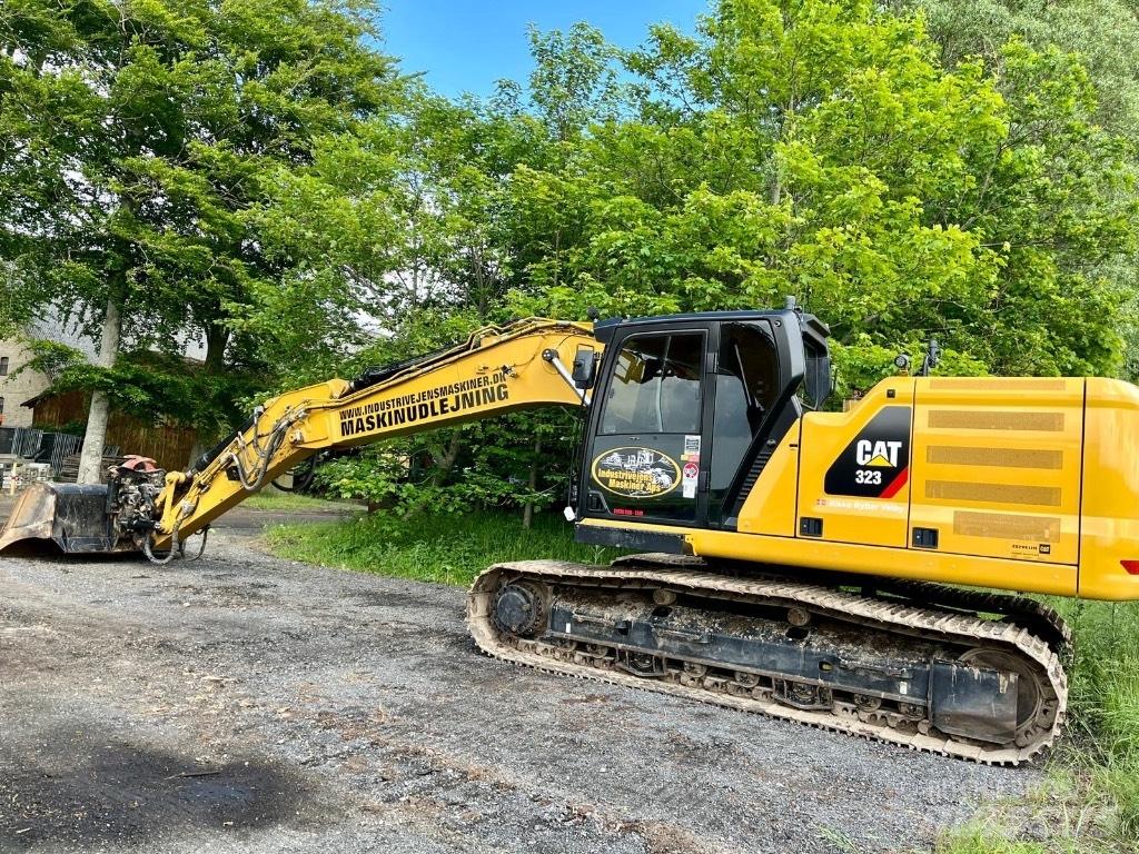 CAT 323 NG - nextgen Bagri goseničarji