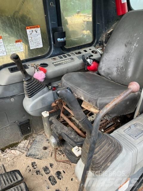 Komatsu PC 200 Bagri goseničarji
