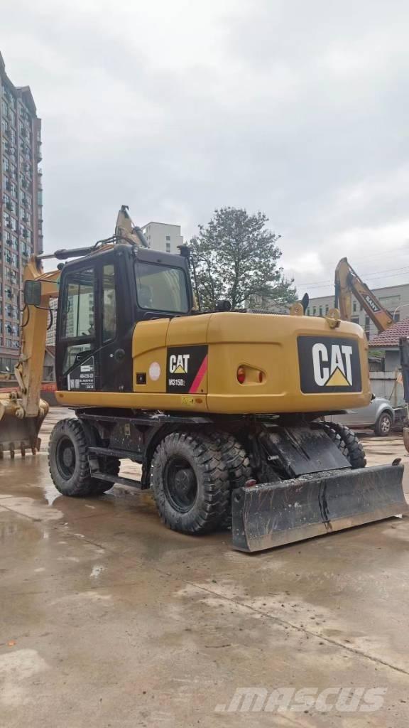 CAT M 315 D Bagri na kolesih