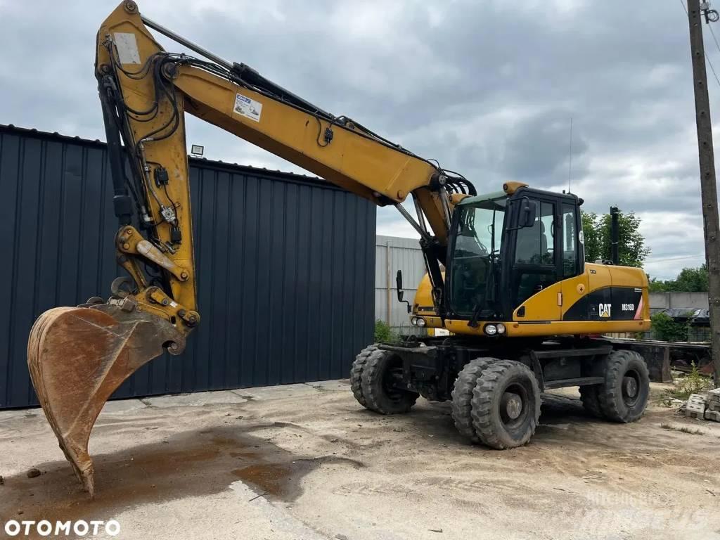CAT M 316 D Bagri na kolesih