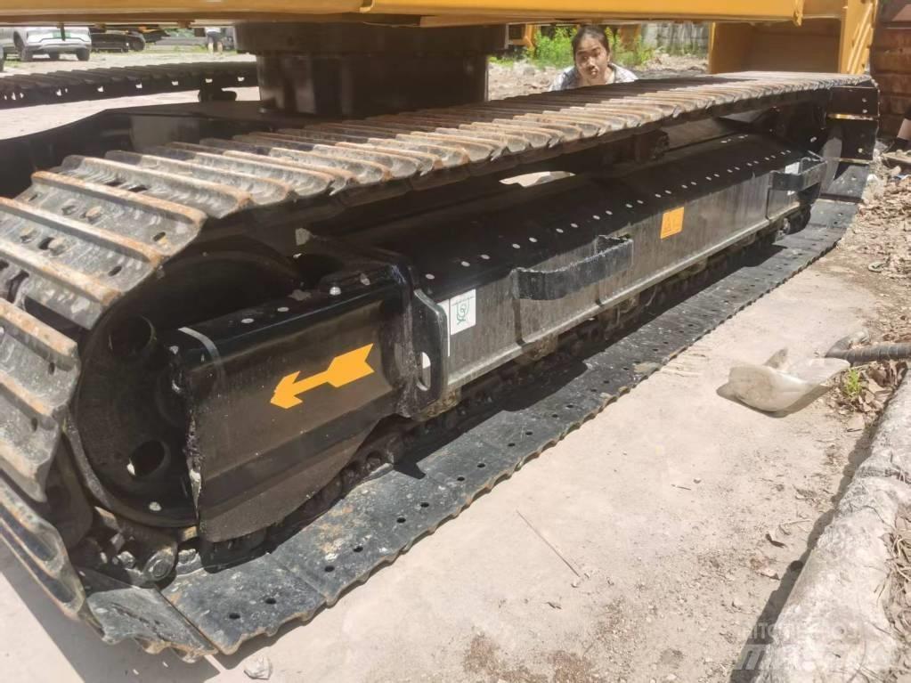 CAT 310 Bagri goseničarji