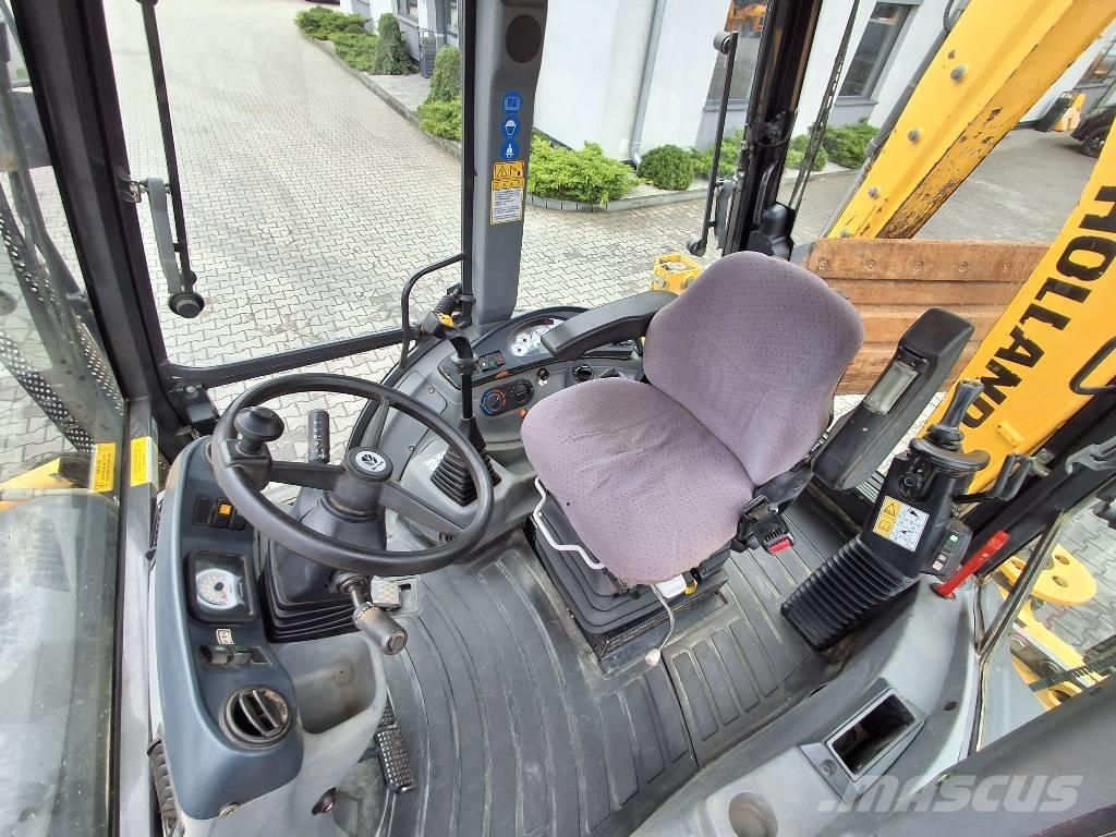 New Holland B 115 C Rovokopači