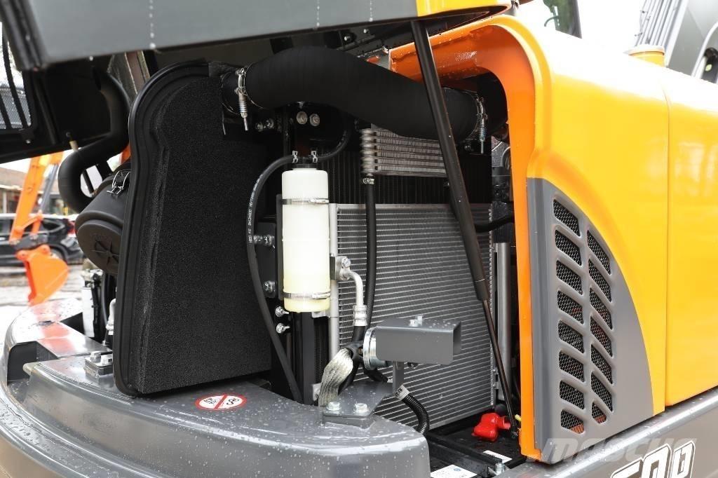 Develon DX 60 D Bagri na kolesih