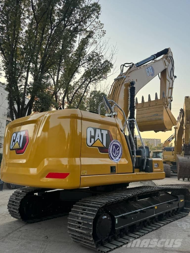 CAT CAT323 Midi bagri 7t – 12t