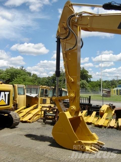 CAT 320 Bagri goseničarji