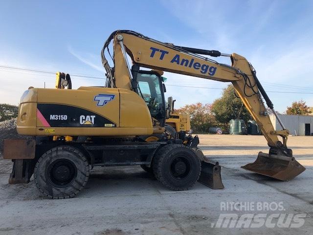 CAT M 315 D Bagri na kolesih