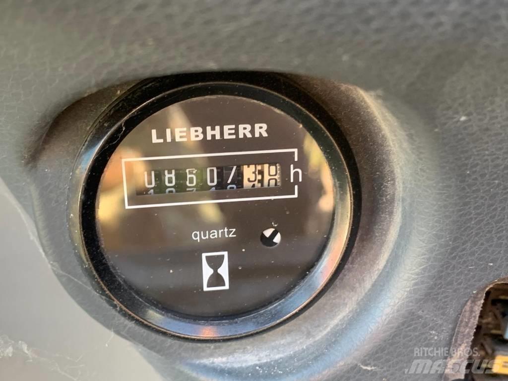 Liebherr A 312 Bagri na kolesih
