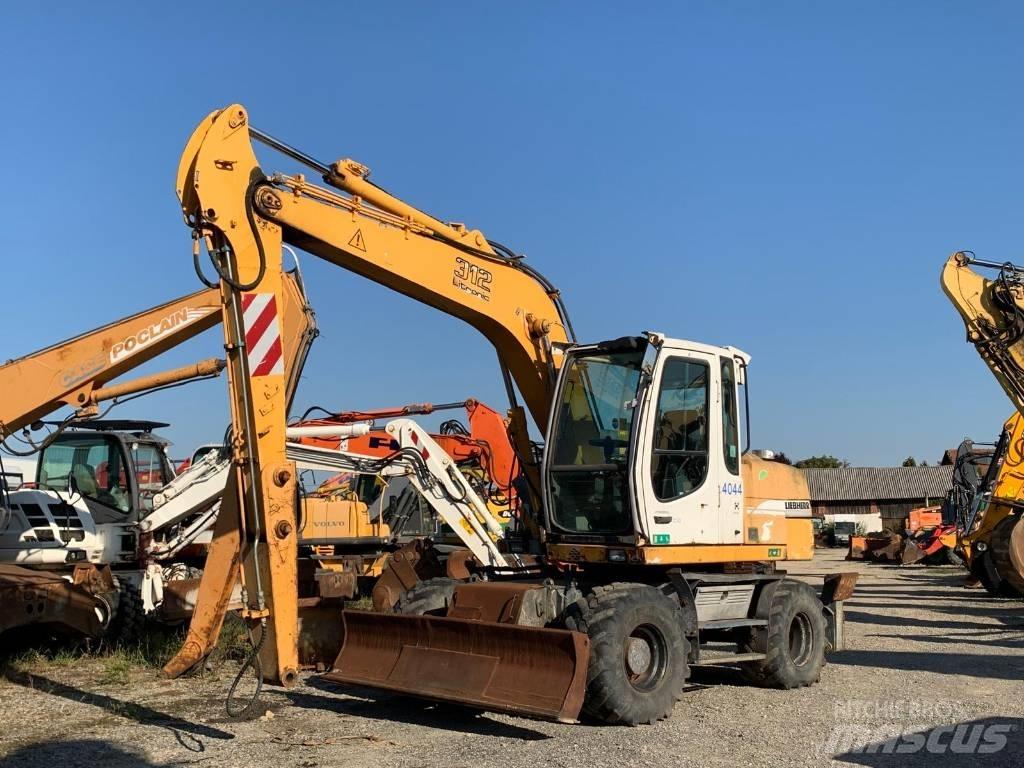 Liebherr A 312 Bagri na kolesih