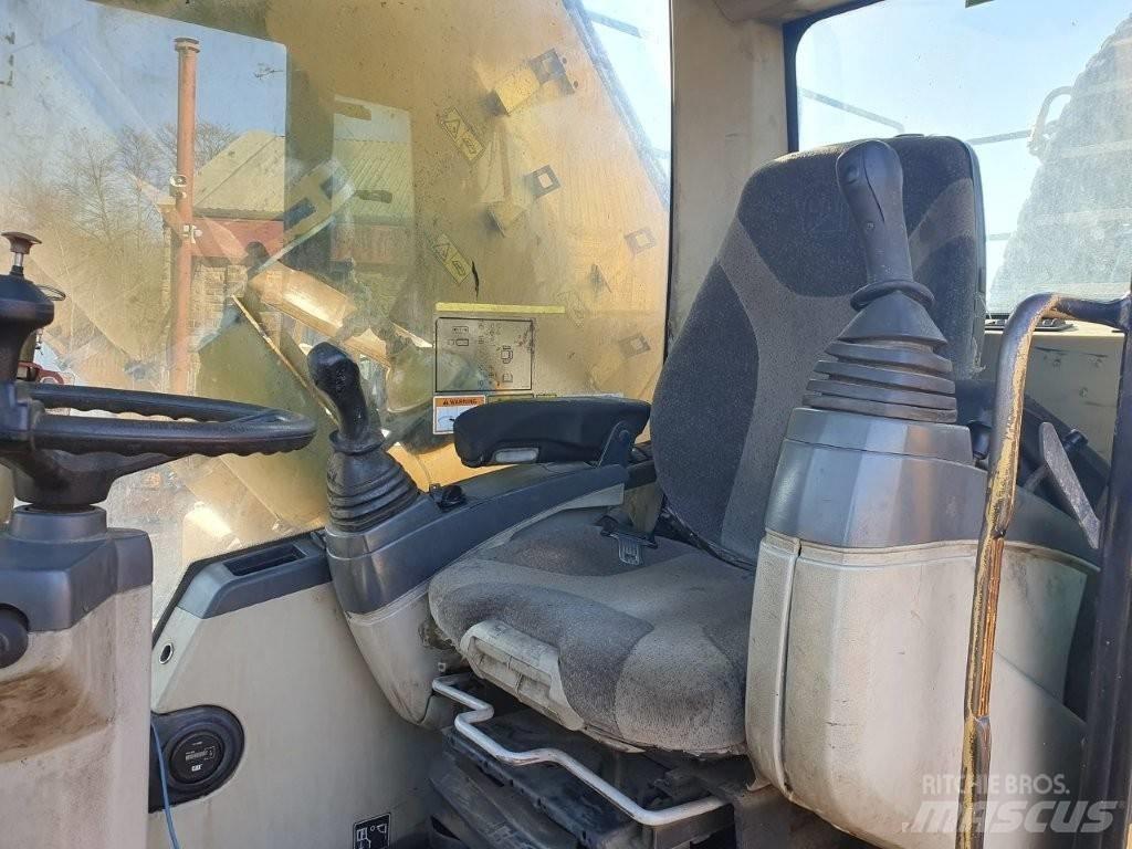 CAT M 325 C MH Bagri za prekladanje primarnih/sekundarnih surovin