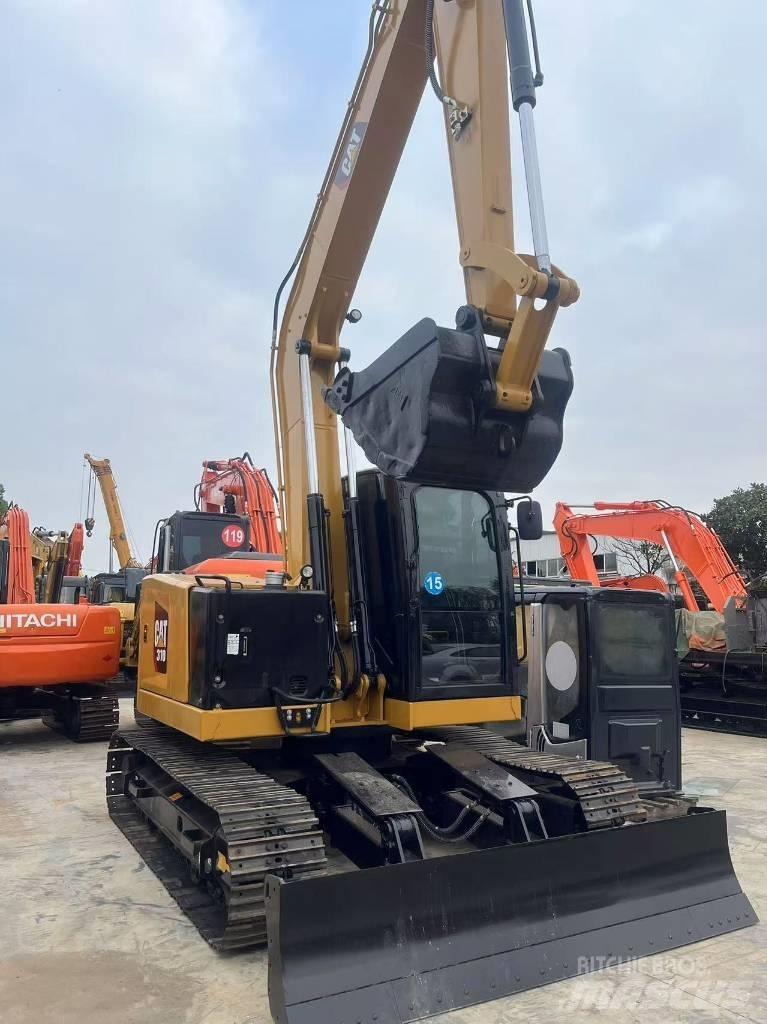 CAT 310 Bagri goseničarji