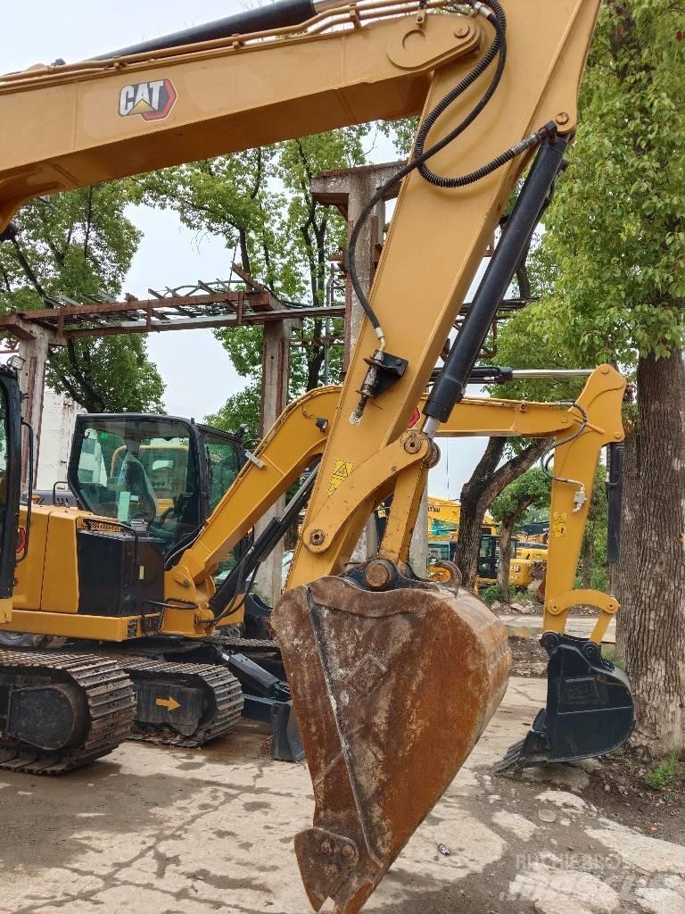 CAT 310 Bagri goseničarji