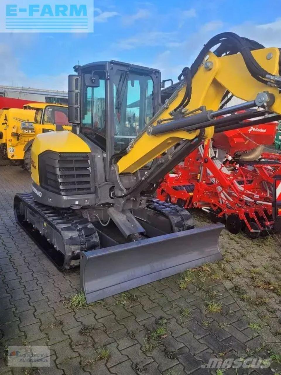 New Holland e55d Mini bagri <7t