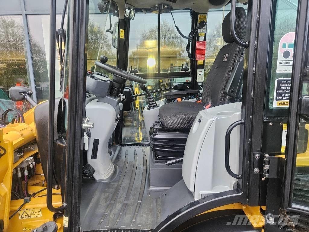 CAT 908m Kolesni nakladalci