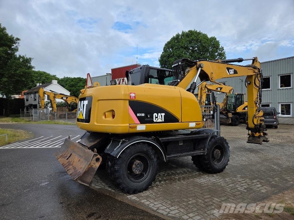 CAT M313D Bagri na kolesih