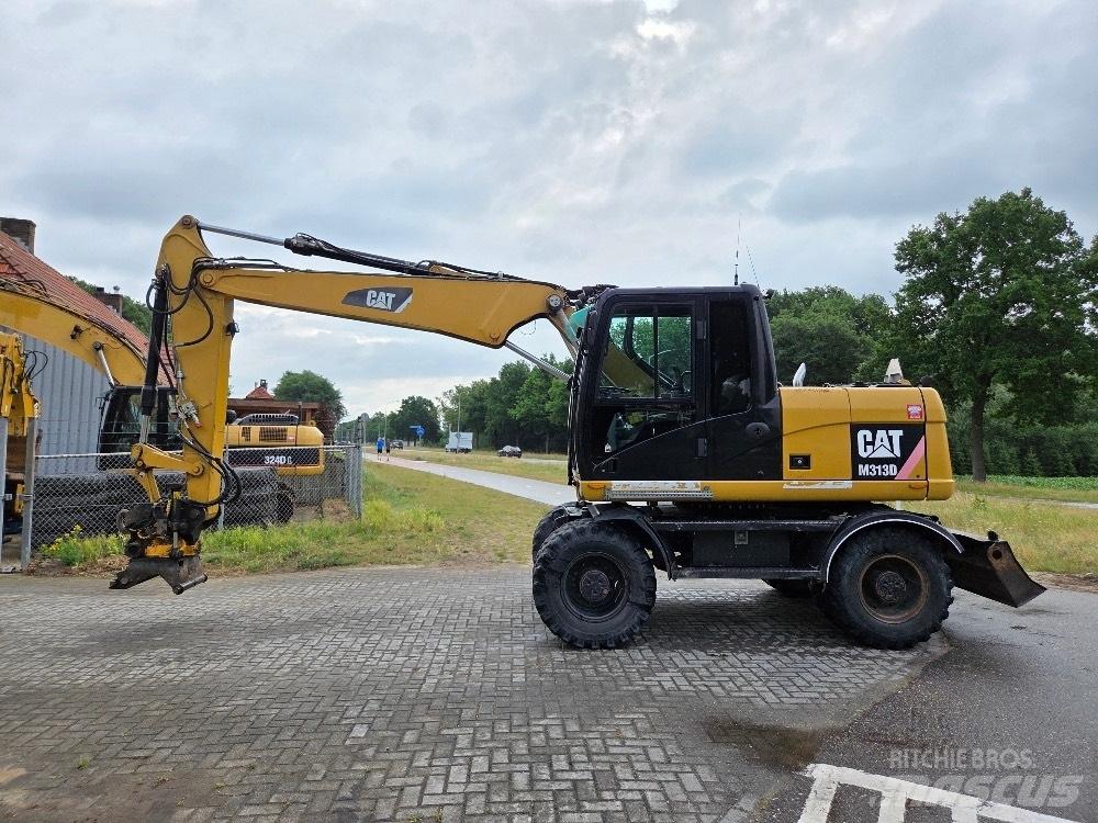 CAT M313D Bagri na kolesih