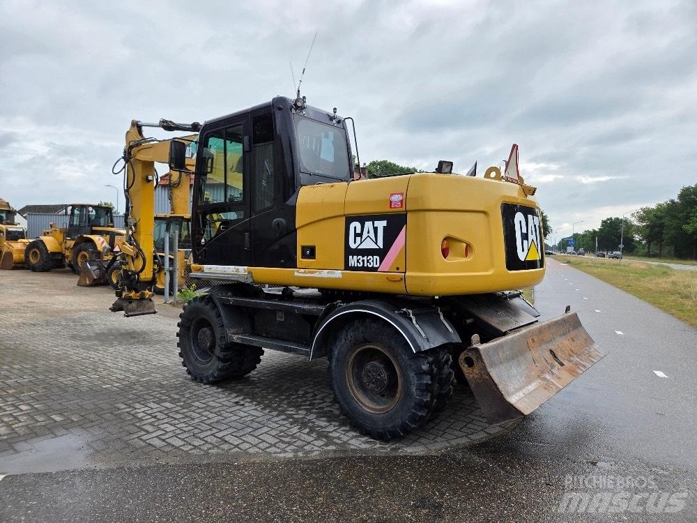 CAT M313D Bagri na kolesih