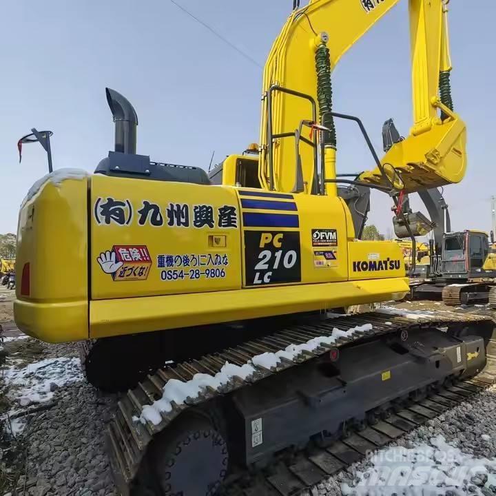 Komatsu PC 210 Bagri goseničarji