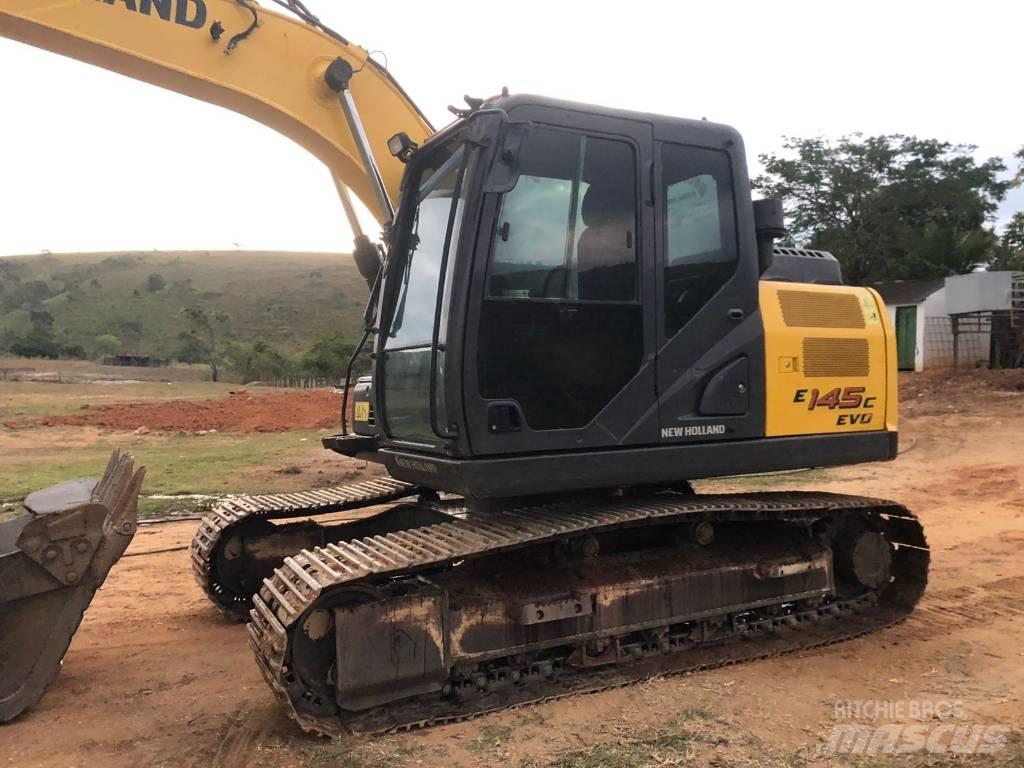 New Holland E 145 Bagri goseničarji