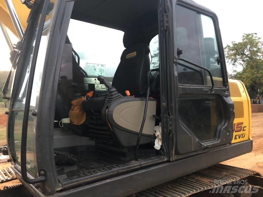 New Holland E 145 Bagri goseničarji