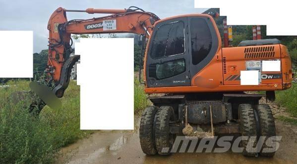 Doosan DX 140 W Bagri na kolesih