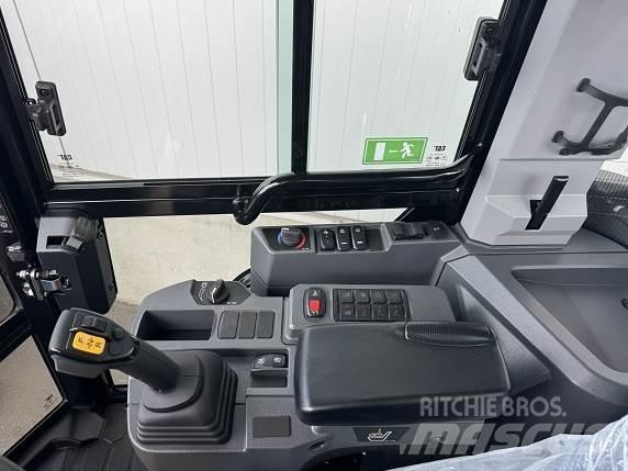 CAT 906 Kolesni nakladalci