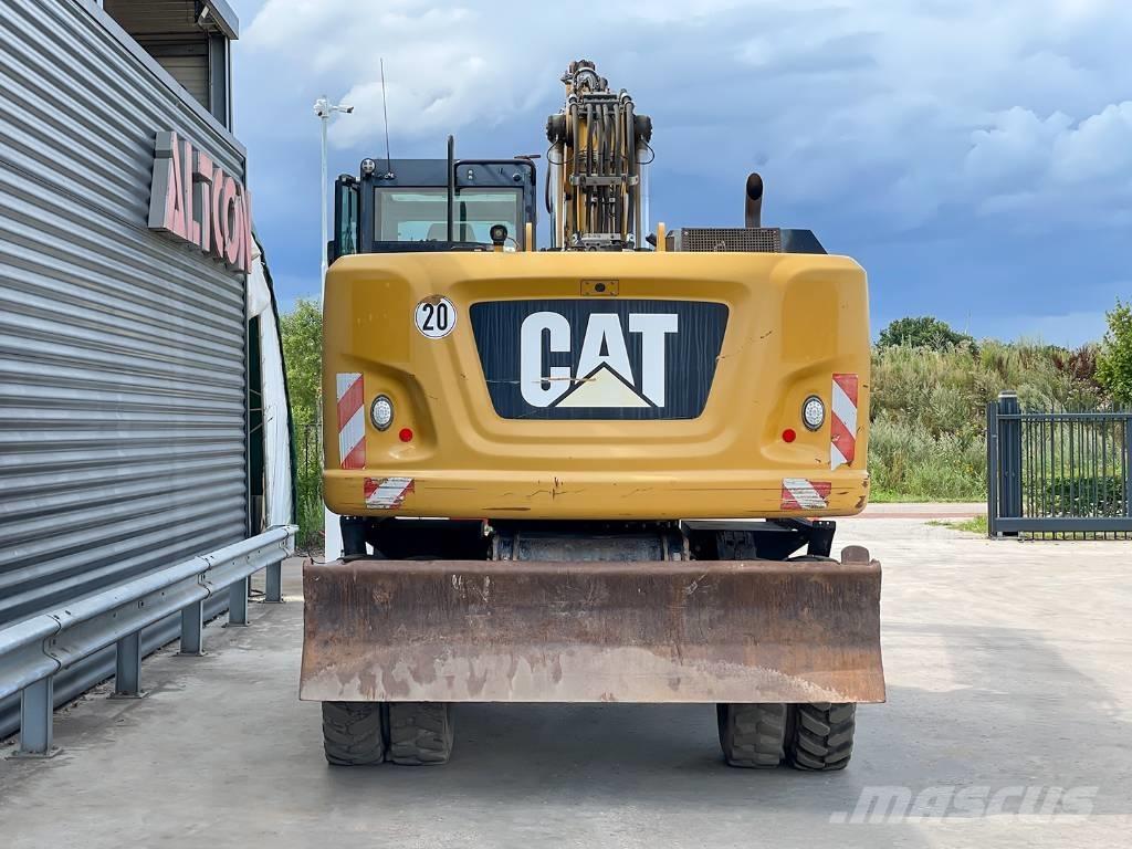 CAT M318F Bagri na kolesih