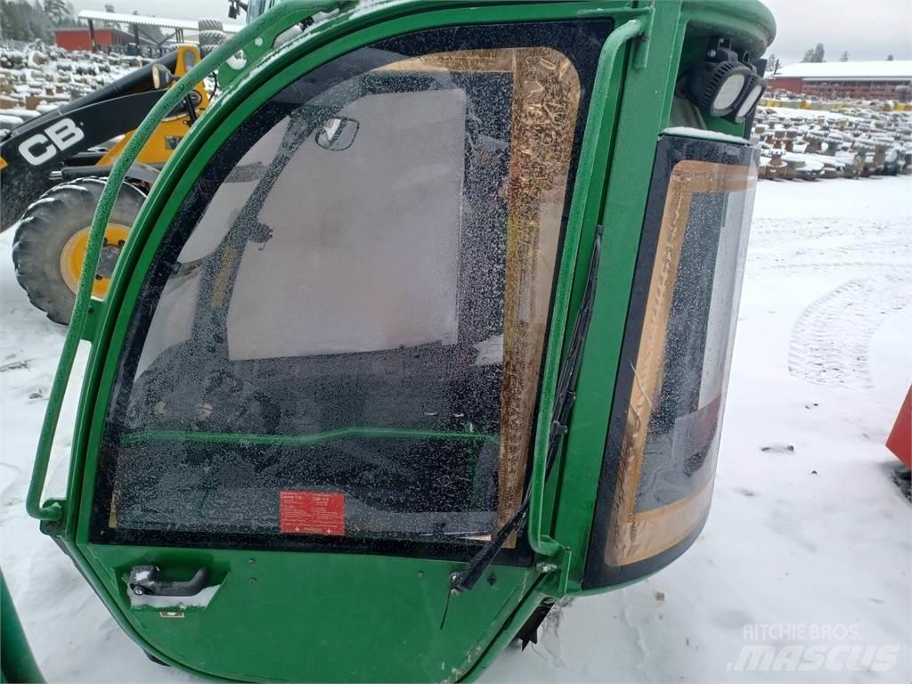 John Deere 1210e Kabine in notranjost