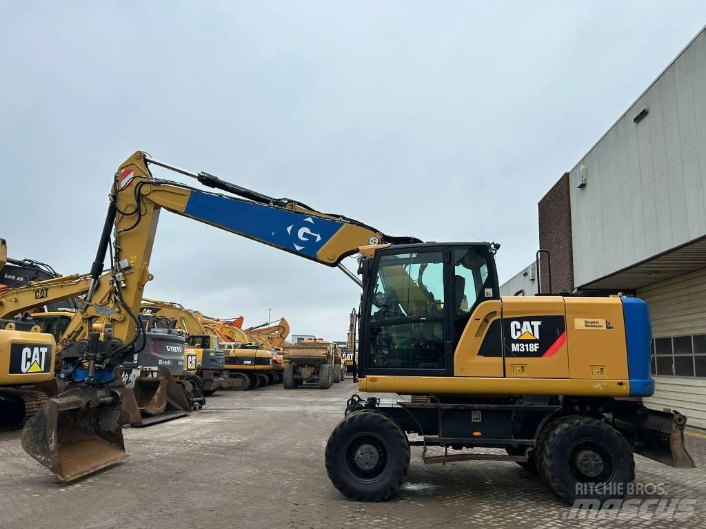 CAT M 318 F Bagri na kolesih
