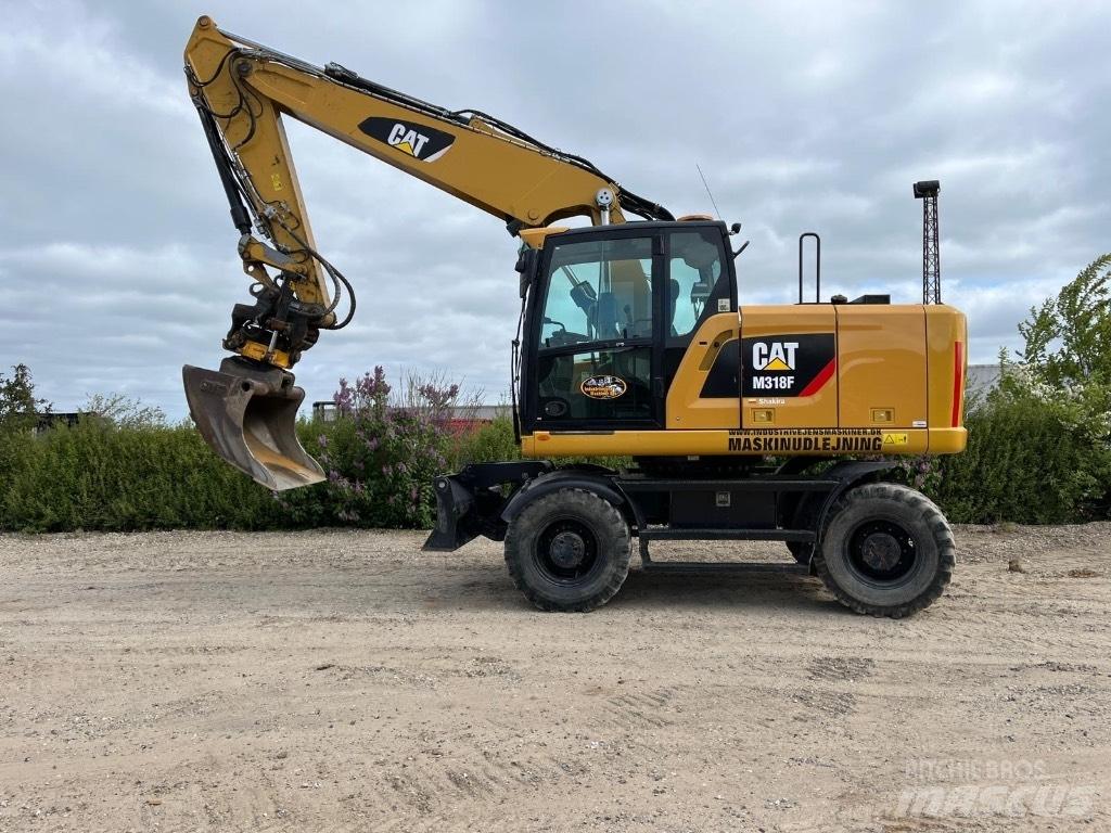 CAT M 318 F Bagri na kolesih