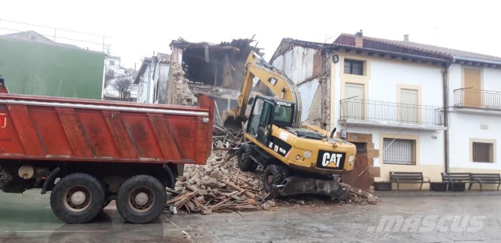 CAT M318d Bagri na kolesih