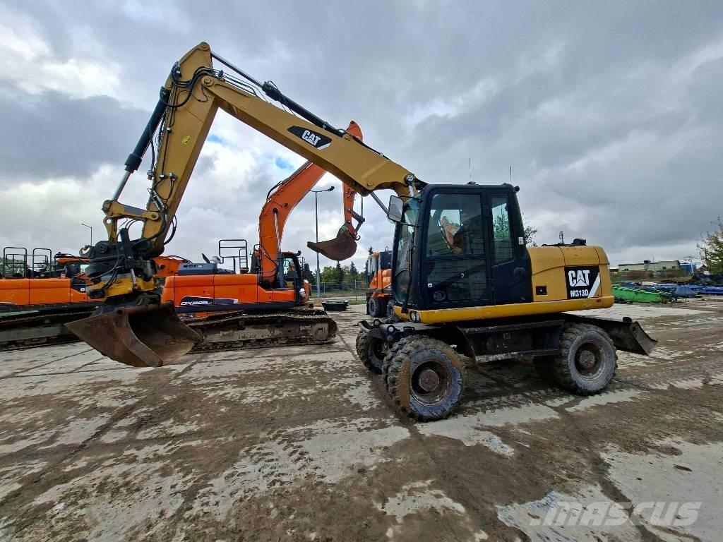 CAT M313D Bagri na kolesih