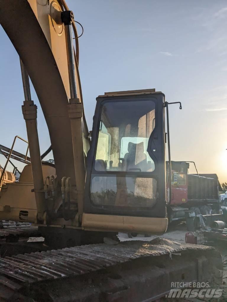 CAT 320 B L Kolesni nakladalci
