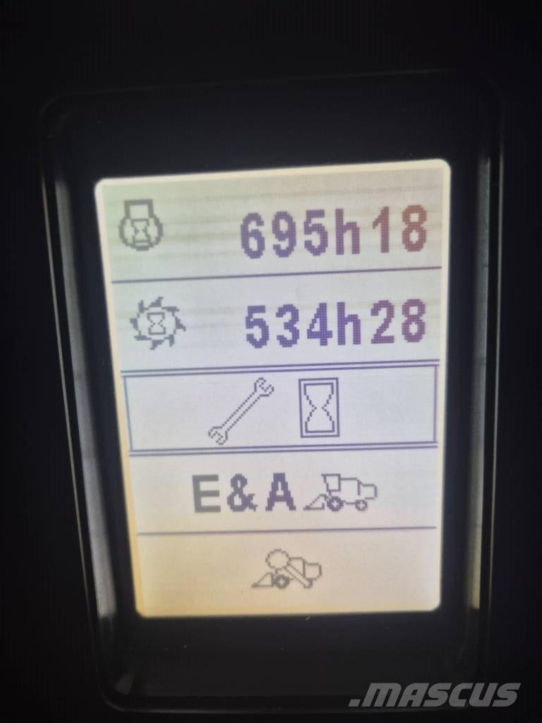 New Holland TC 5.90 Kombajni