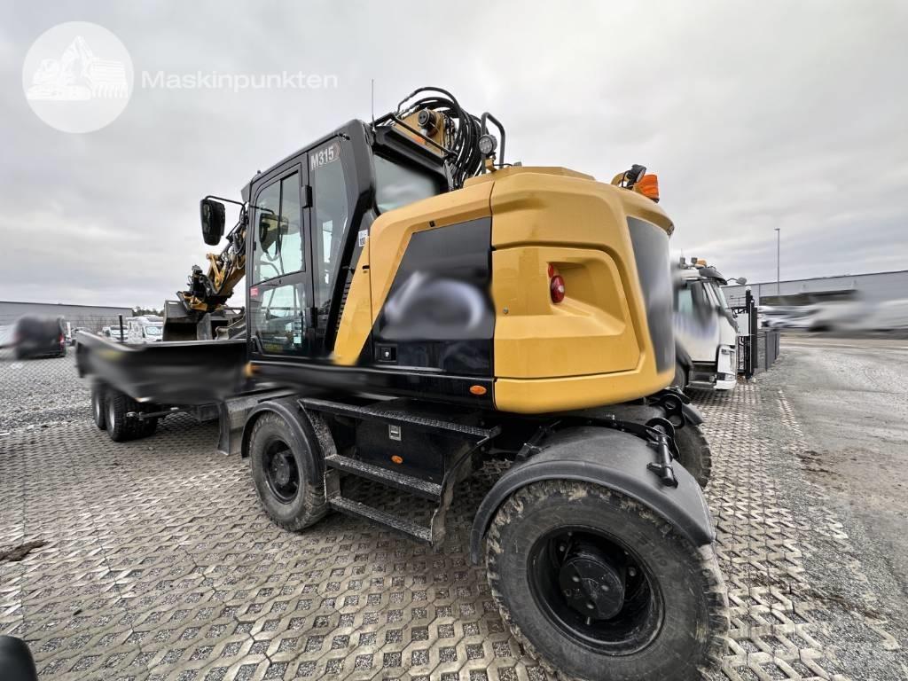 CAT M 315 Bagri na kolesih