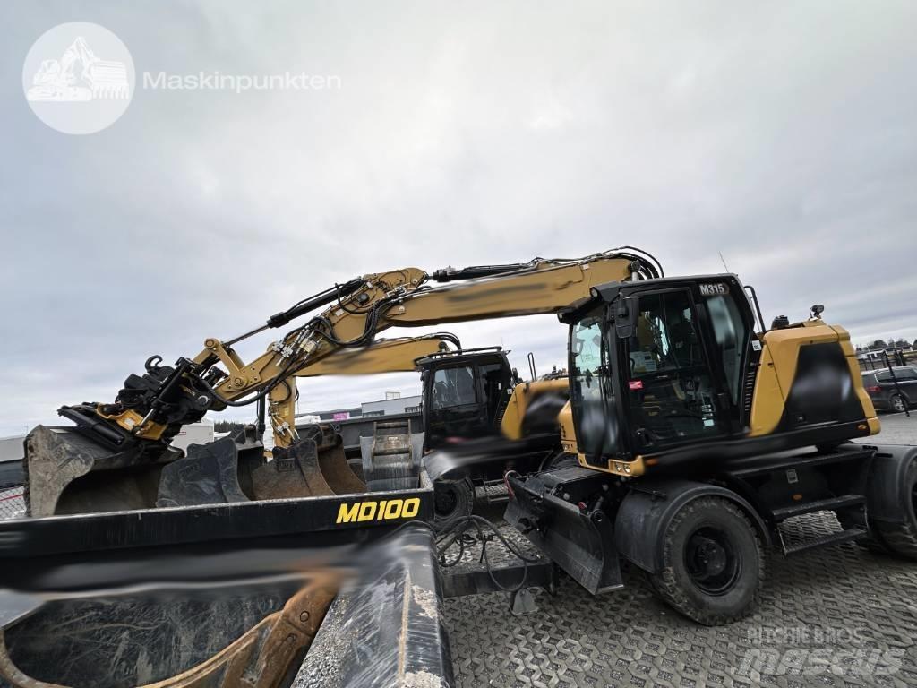 CAT M 315 Bagri na kolesih